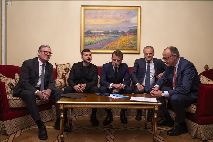 From left, British Prime Minister Keir Starmer, President Volodymyr Zelenskyy, French President Emmanuel Macron, Polish Prime Minister Donald Tusk and German Chancellor Friedrich Merz make a call to U.S. President Donald Trump from Kyiv, Ukraine, on Saturday, May 10, 2025.