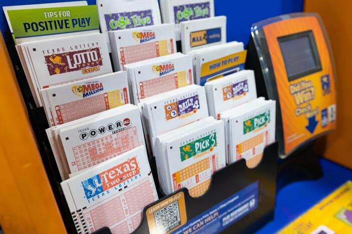 A Texas Lottery display promoting support for Texas education and veterans stands inside Lucky Rudy's in Rosenberg, Texas, on May 5, 2025.