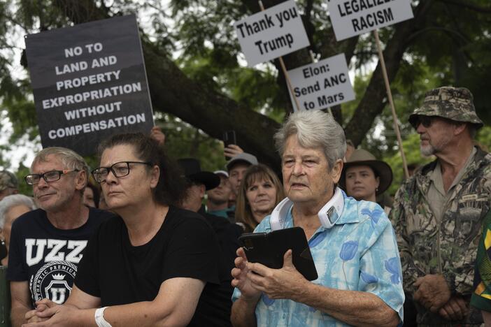 White Afrikaaner South Africans demonstrate in support of U.S. President Donald Trump in front of the U.S. embassy in Pretoria, South Africa, Feb. 15, 2025.