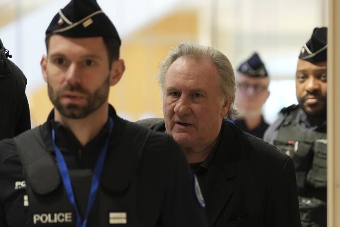 French actor Gérard Depardieu leaves for a break during his trial for the alleged sexual assaults of two women on a film set in 2021.