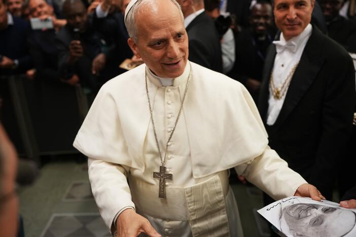 Pope Leo XIV arrives for an audience with thousands of journalists and media workers at Paul VI Audience Hall in Vatican City. The audience with journalists has become a tradition among newly elected popes.