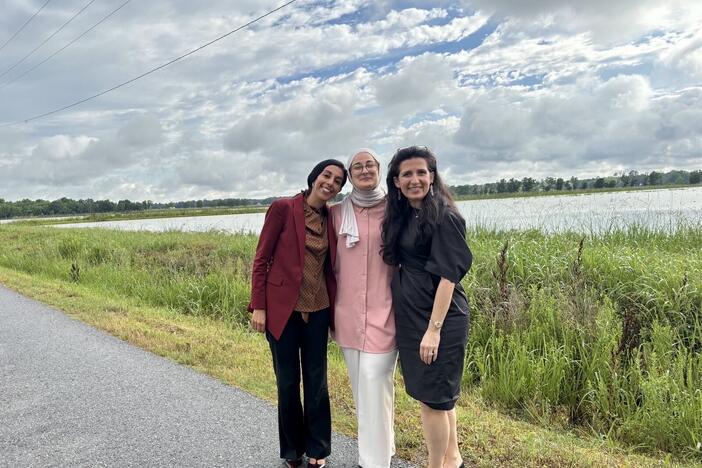 Rümeysa Öztürk (center) after being released from ICE custody Friday evening. Accompanied by Nora Ahmed, legal director of the ACLU of Louisiana (left) and  Öztürk's attorney, Mahsa Khanbabai (right).