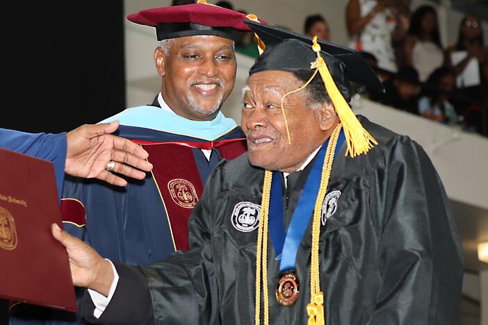 Linwood Riddick, who turns 80 on Monday, accepts his bachelor's degree at South Carolina State University on Friday May 9th.