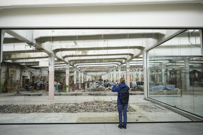 A visitor takes a photo at the Museum of Survivors, located in a factory where Oskar Schindler saved some 1200 Jews during WWII, in Brnenec, Czech Republic, on May 10.