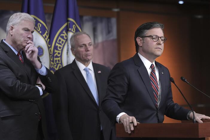 Speaker of the House Mike Johnson, R-La., joined (from left) by House Majority Whip Tom Emmer, R-Minn., and House Majority Leader Steve Scalise, R-La., talks to reporters at the Capitol in Washington, April 8, 2025.