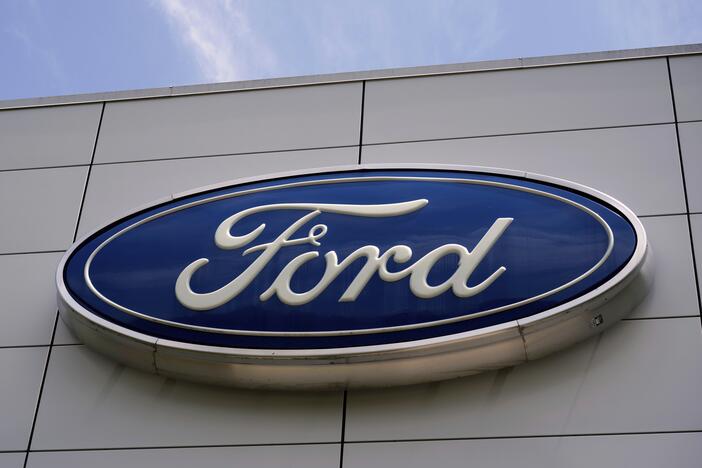 The Ford logo is seen above the entrance to the Ford Motor Company Kentucky Truck Plant in Louisville, Ky.