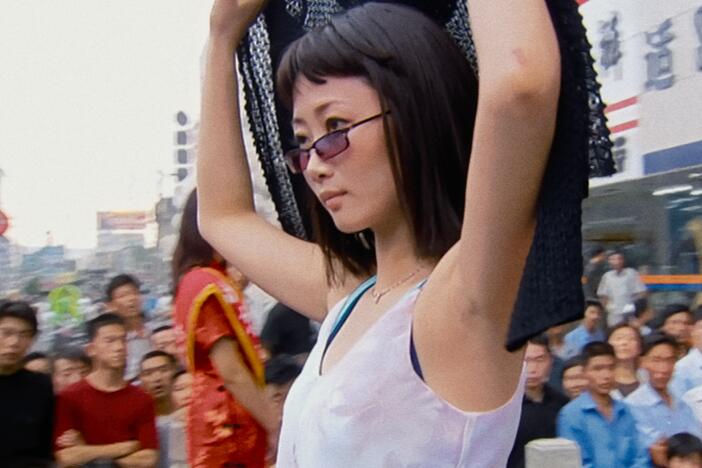 Qiaoqiao (Zhao Tao) experiences romance and heartbreak in <em>Caught by the Tides.</em>