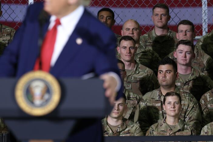 Michigan Air National Guard troops listen as President Trump speaks during a visit with Michigan Air National Guard Troops on April 29 at Selfridge Air National Guard Base, Mich.