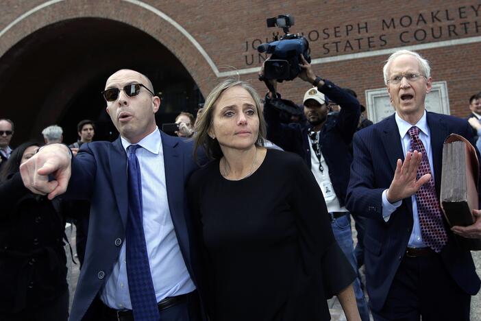 District Court Judge Shelley Joseph leaves Boston federal court in April 2019 for allegedly helping a man in the country illegally evade immigration officials as he left her Newton, Mass., courthouse.