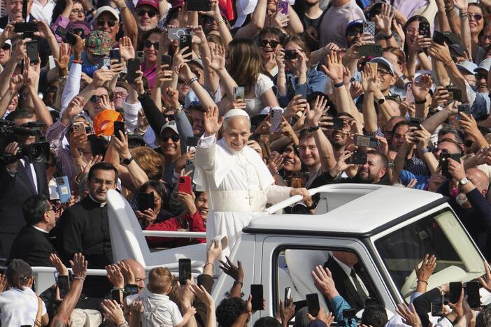 Pope Leo XIV on his popemobile tours St. Peter's Square at the Vatican prior to the inaugural Mass of his pontificate, Sunday, May 18, 2025.