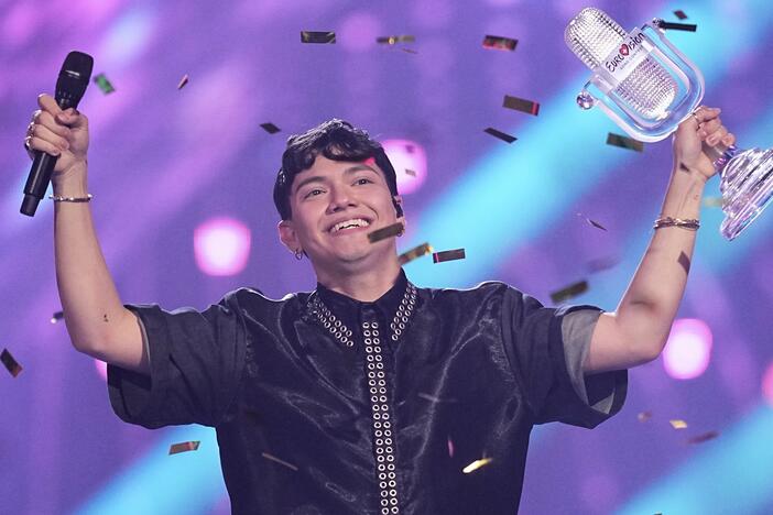 JJ, winner of the 2025 Eurovision Song Contest, holds up the trophy he won for Austria with the song "Wasted Love" during the Grand Final of the 69th Eurovision Song Contest, in Basel, Switzerland, Saturday, May 17, 2025.