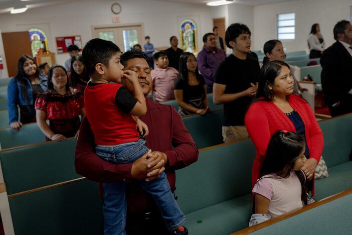 Churchgoers pray during service at the Evangelical church Sunday, May 11, 2025, in Tampa, Florida. The service focused on celebrating the mothers in attendance, as well as Maurilio Ambrocio's continued detention in an immigration facility. 

(Lexi Parra for NPR)
