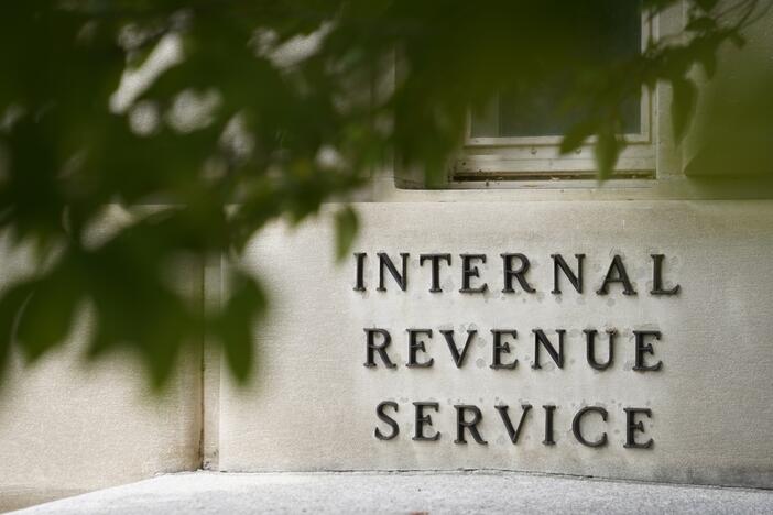 A sign is displayed outside the Internal Revenue Service building on May 4, 2021, in Washington. (AP Photo/Patrick Semansky, File)