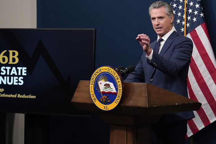 Calif. Gov. Gavin Newsom presents his revised 2025-2026 state budget during a news conference in Sacramento, Calif., Wednesday, May 14, 2025.