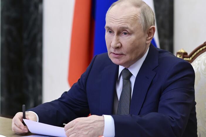 Russian President Vladimir Putin chairs a Security Council meeting via videoconference at the Kremlin in Moscow, Friday.