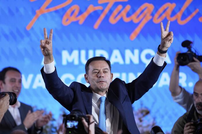 Incumbent Prime Minister and leader of the center-right Social Democratic Party Luis Montenegro gestures while addressing his supporters following Portugal's general election, in Lisbon on Monday.