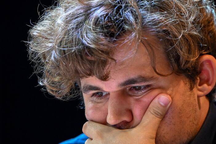 Norway's chess grandmaster Magnus Carlsen gestures during a game in the Tata Steel Chess India tournament in Kolkata on Nov. 17, 2024.