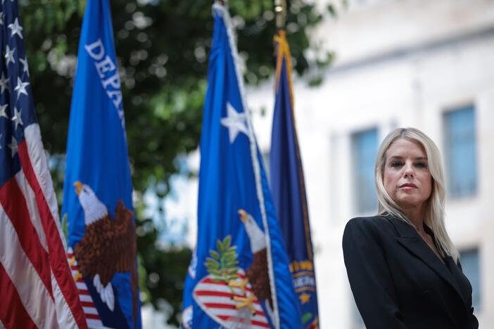 U.S. Attorney General Pam Bondi is seen during a press conference on May 7 in Washington, D.C. Bondi's Department of Justice recently charged a few noncitizens for alleged illegal voting, citing assistance from the Department of Government Efficiency, or DOGE.