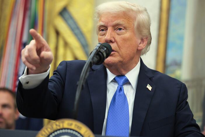 President Trump takes questions from reporters at an event in the Oval Office on May 19, 2025.
