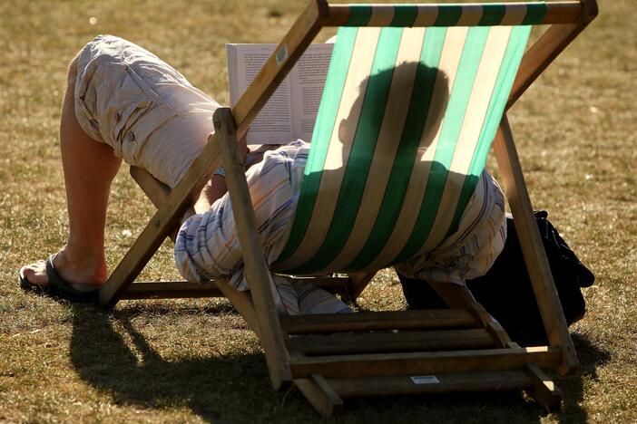 A syndicated, AI-generated summer reading list featuring fake books by real authors was published in major newspapers this week. Above, a reader enjoys the sunshine in Hyde Park in London in 2009.
