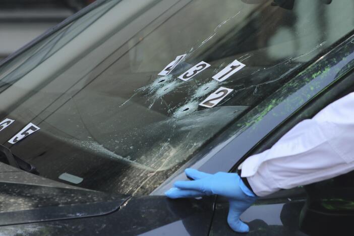 Crime scene investigators work at the site where the personal secretary and an advisor to Mexico City's mayor were killed by gunmen on a motorcycle, in Mexico City, Tuesday, May 20, 2025. (AP Photo/Tristan Velazquez)