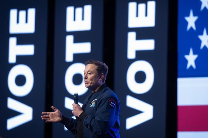 Elon Musk speaking during a town hall meeting on March 30, 2025 in Green Bay, Wisc. ahead of a state Supreme Court election where he invested millions of dollars, only to see his preferred candidate lose. The billionaire announced on Tuesday that he planned to spend less on politics going forward.