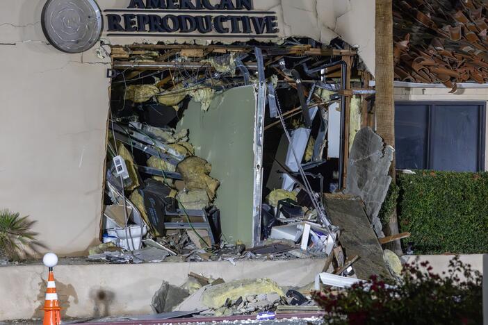 The damaged front of the American Reproductive Centers fertility clinic stands following a bomb blast on May 17 in Palm Springs, California. A suspected bomber is believed to have post a manifesto to social media before the explosion.