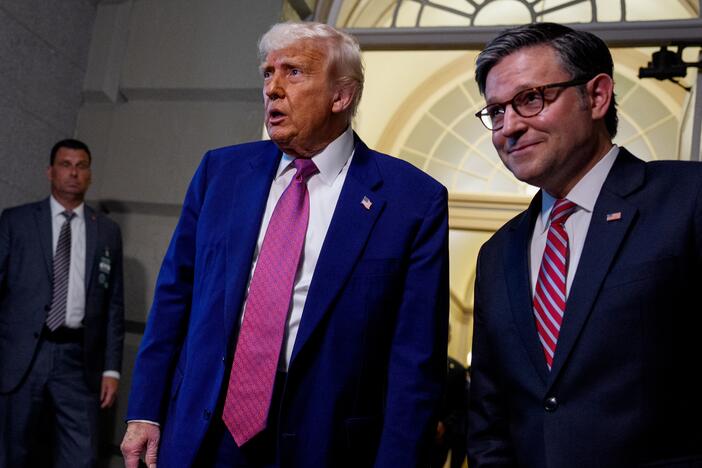 U.S. President Donald Trump, accompanied by Speaker of the House Mike Johnson (R-LA) (R), departs a House Republican meeting at the U.S. Capitol on May 20, 2025 in Washington, DC. Trump joined conservative House lawmakers to help push through their budget bill after it advanced through the House Budget Committee on Sunday evening.