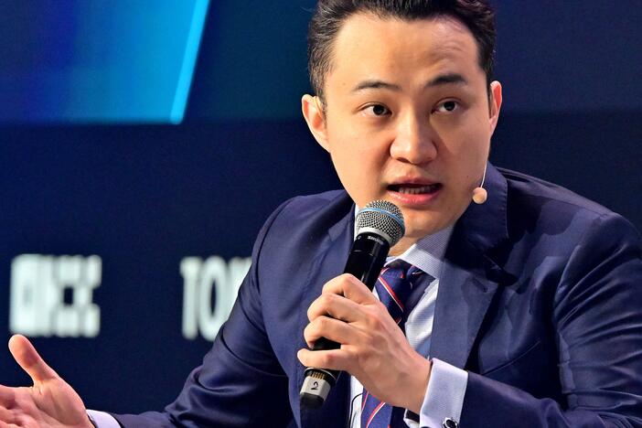 Cryptocurrency entrepreneur Justin Sun participates in a session during the Token 2049 crypto conference in Dubai on May 1, 2025. Sun is a top investor in Trump's meme coin and says he plans to attend an exclusive dinner with the president.