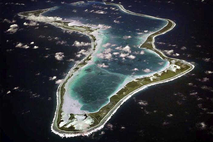 This image released by the U.S. Navy shows an aerial view of Diego Garcia, a remote island in the Indian Ocean.