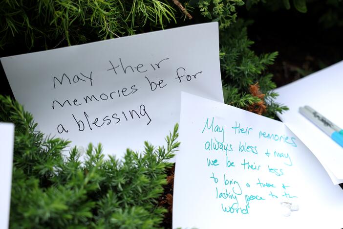 Handwritten notes are left at the site of the recent shooting outside the Lillian and Albert Small Capital Jewish Museum on May 22, 2025, in Washington, D.C..