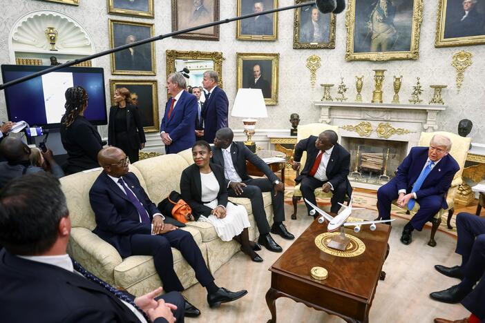 US President Donald Trump, right, and Cyril Ramaphosa, South Africa's president, second right, as a video plays during a meeting in the Oval Office of the White House in Washington, DC, US, on Wednesday, May 21, 2025.