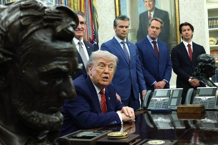 President Trump takes questions from reporters in the Oval Office on May 23, 2025.