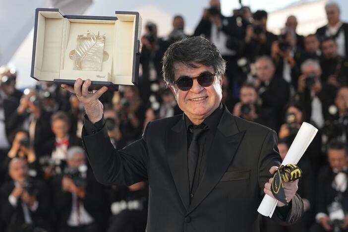 Director Jafar Panahi, winner of the Palme d'Or for the film 'It Was Just an Accident', poses for photographers at the awards ceremony photo call at the 78th international film festival, Cannes, southern France, Saturday, May 24, 2025. (AP Photo/Natacha Pisarenko)