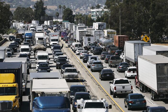 Vehicles drive on Interstate 5 ahead of the Memorial Day weekend Friday in Los Angeles. Departments of motor vehicles across the country are warning of a new batch of scam text messages that seek out recipients' personal information.