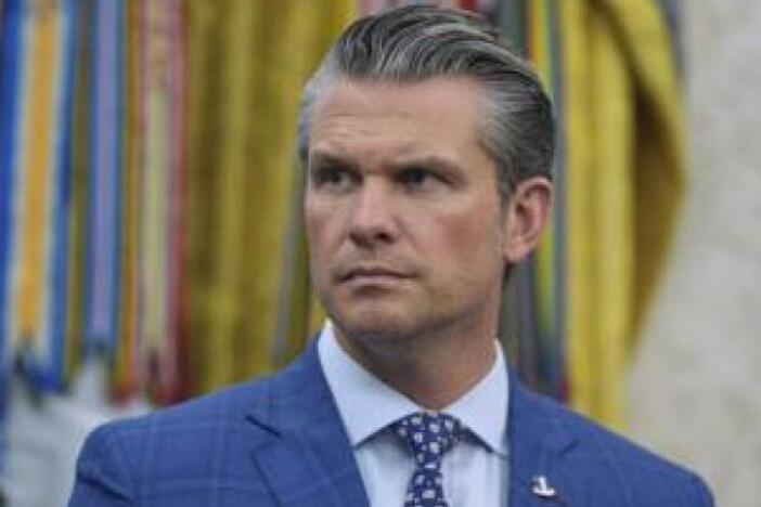 Defense Secretary Pete Hegseth listens during an event with President Trump to sign executive orders regarding nuclear energy in the Oval Office of the White House, Friday, May 23, 2025, in Washington, D.C..