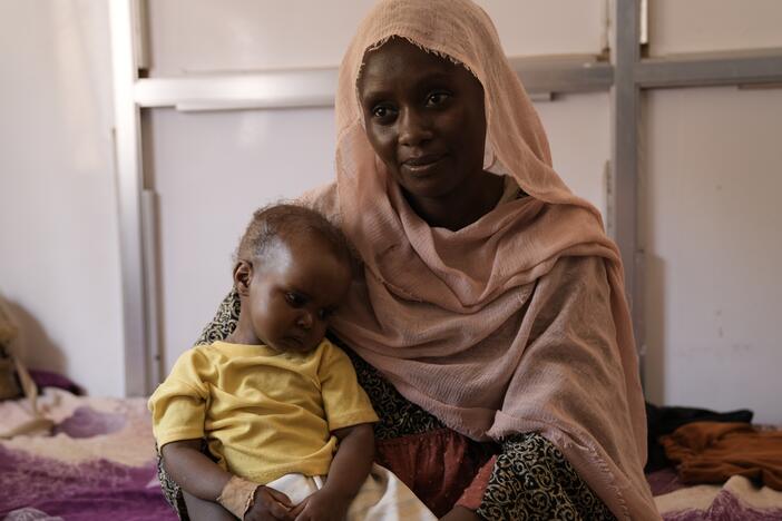 Alawiya Zakaria and 1-year-old Sabba. The daughter is painfully thin but now doing better from treatment at Al-Buluk Pediatric Hospital in Omdurman, a city across the White Nile River from Khartoum, the capital city where Zakaria lives. There are currently no functioning hospitals in Khartoum, a toll of the war in Sudan.