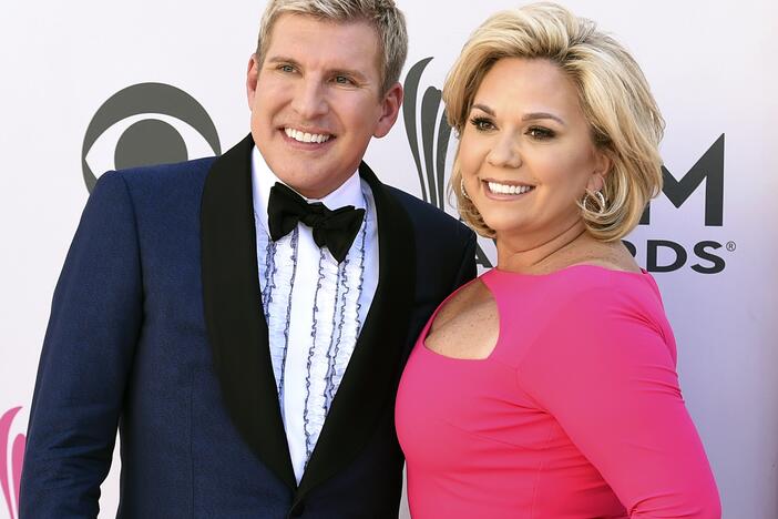 Trump announced Tuesday that he will grant full pardons to reality TV stars Todd and Julie Chrisley, pictured in 2017.