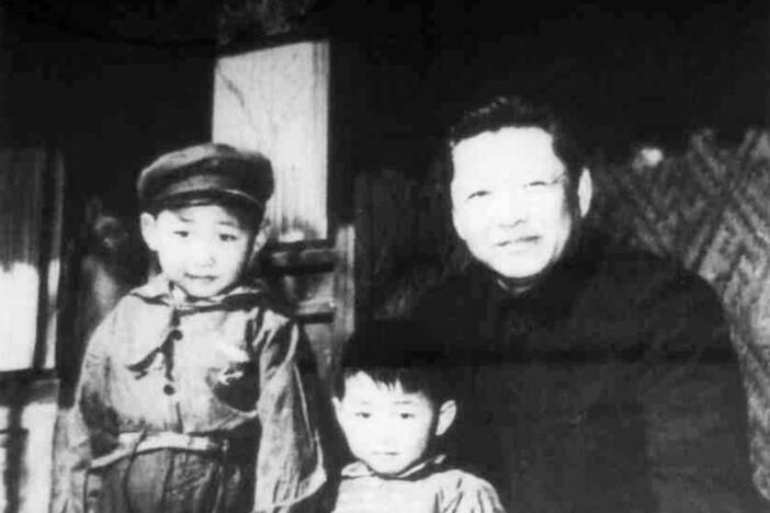 Xi Jinping, left, with his father Xi Zhongxun in 1958.