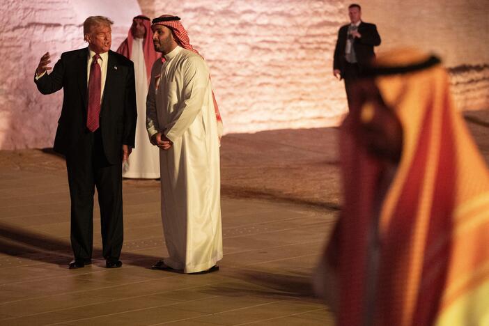 President Trump and Saudi Arabia's Crown Prince Mohammed bin Salman walk in the old district on the outskirts of the Saudi capital Riyadh on May 13. Trump announced several big economic agreements on his recent trip to the Middle East, but said little about the conflicts in the region.