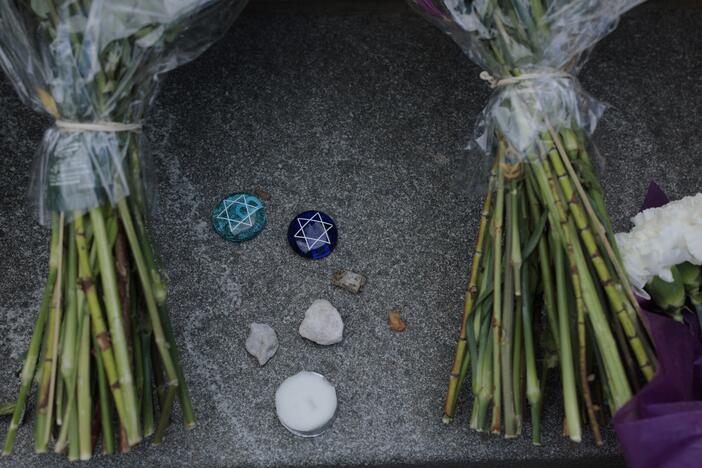 Flowers and stones are left outside the Lillian and Albert Small Capital Jewish Museum on May 23 in Washington, D.C.