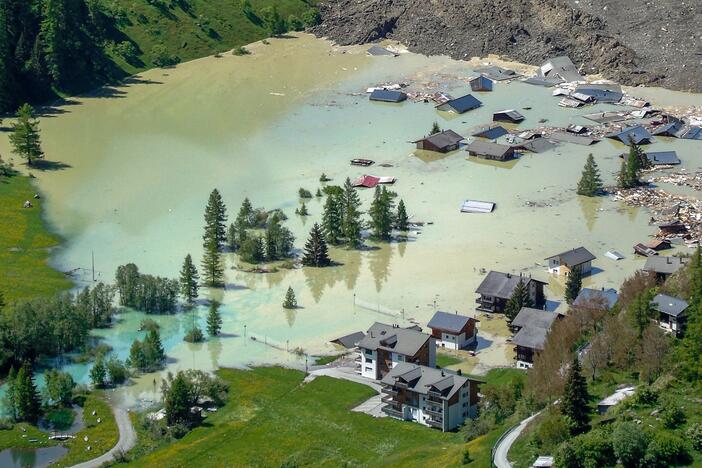 The village of Blatten, in a valley below the Bietschhorn mountain in the Swiss Alps, was destroyed Wednesday by a landslide after part of the huge Birch Glacier collapsed. A local river is now blocked and forming a lake that is flooding buildings that remain, authorities said.