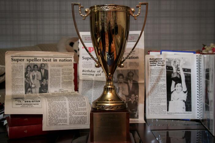 Balu Natarajan won the Scripps National Spelling Bee in 1985. Shown are his trophy and newspaper clippings detailing his win.
