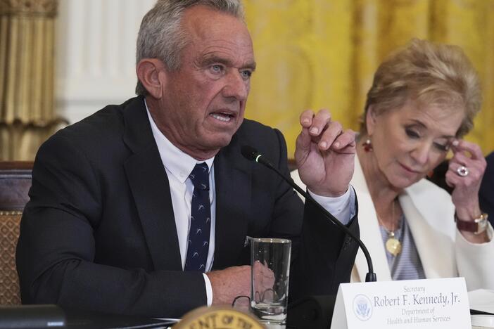 Health and Human Services Secretary Robert F. Kennedy Jr. speaks as Education Secretary Linda McMahon listens during a Make America Healthy Again (MAHA) Commission Event in the East Room of the White House, Thursday, May 22, 2025, in Washington.