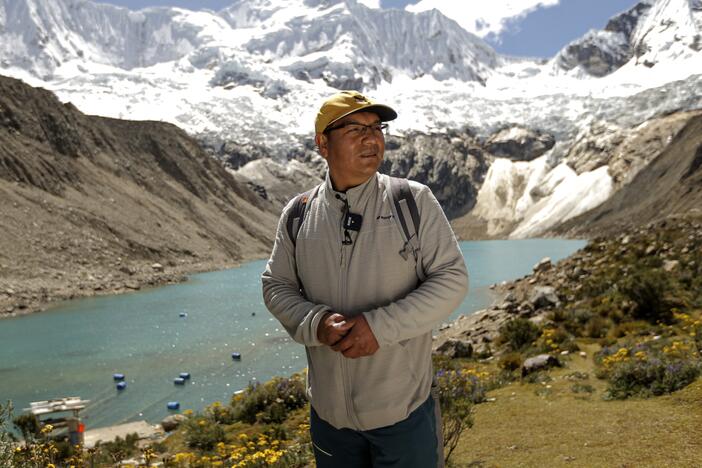 Saul Luciano Lliuya in front of Lake Palcacocha, located at 4,650 meters above sea level at the Huascaran National Park, in Huaraz, northeastern Peru, on May 23, 2022.