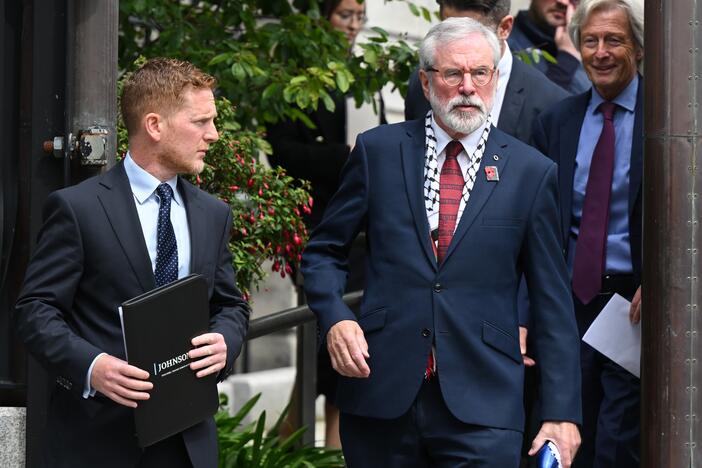 Former Sinn Fein leader Gerry Adams leaves the court in Dublin on Friday after winning one of Ireland's highest-profile cases.