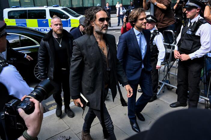 Russell Brand arrives at Southwark Crown Court on Friday in London.