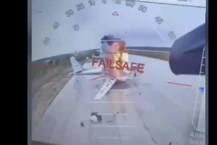 In this image taken from video released June 1, 2025, by a source in the Ukrainian Security Service shows a Ukrainian drone striking Russian planes deep in Russia's territory.