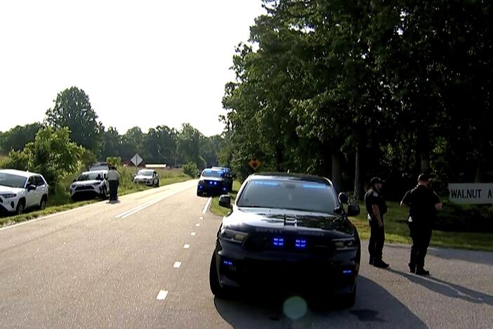 In this image taken from WSOC video, various police vehicles gather outside a community after a mass shooting, Sunday, June 1, 2025, in Hickory, a city in Catawba County, N.C.