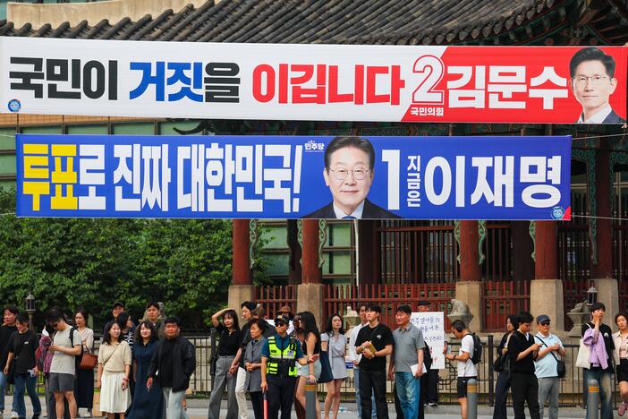 Election campaign banners for presidential candidates Lee Jae-myung of the Democratic Party of Korea and Kim Moon-soo of the People Power Party are seen on May 31 as the country's presidential election nears, in Seoul, South Korea.